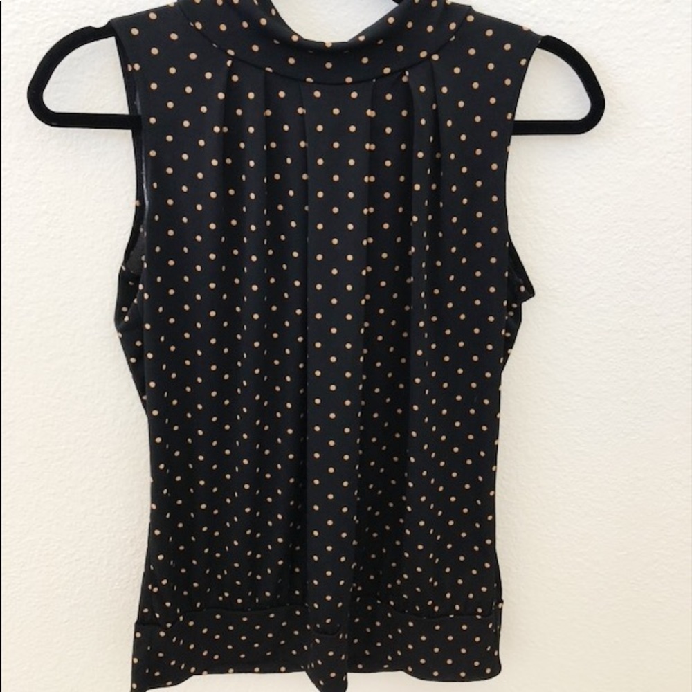 perception concept high neck sleeveless shirt
